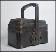 A 19th century Chinese ebonised carry / food box.