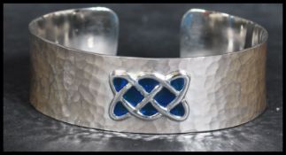 A sterling silver arts and crafts style bangle bra