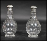 A pair of Victorian silver hallmarked cut glass an