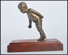 A 20th century gilt finished bronze study of a you
