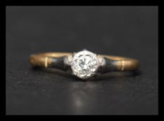 An 18ct gold and diamond solitaire ring. Marked 75