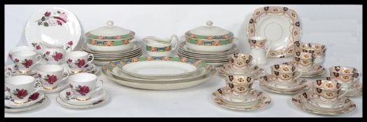 A 1930's Art Deco ceramic dinner service possibly Bristol Pottery together with a chintz pattern