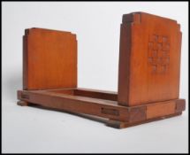 A 20th century Chinese Art Deco lacquered book tro