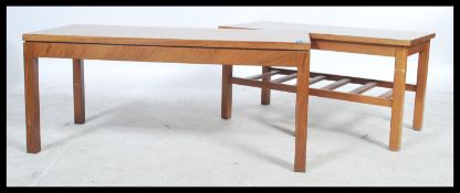 A retro 1970's teak wood coffee - occasional table by Myers having Air Ministry stamps together with