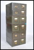 A set of five stacking vintage Industrial 20th century index filing cabinets by Roneo, with a war