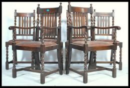 A set of 6 1920's oak barleytwist dining chairs. Raised on barley twist legs united by stretchers