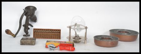A collection of vintage items to include a silver plated brandy warmer and glass, a group of