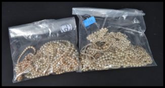 A collection of various graduated pearl necklaces, some with marcasite clasps. Please see images.