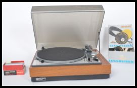 A vintage 20th century Lenco Goldring GL75 stereo transcription turntable, teak case with smoked