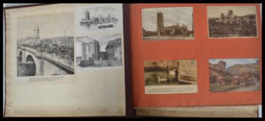 A collection of postcards and photographs contained within a large album dating from the early