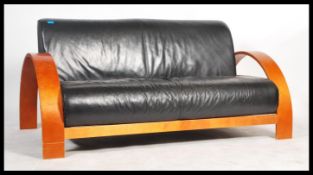 Verikon - A contemporary art deco style bent plywood two seater settee / sofa. The bent arms