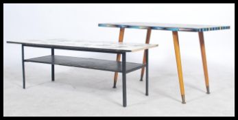 Two retro vintage 20th century  1960's coffee tables both raised on tapering legs with brightly