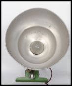 A vintage mid century aluminium clip on factory workers pendant lamp having a half moon shade with
