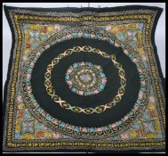 An early 20th century Indian wall hanging having a cotton back with silk threads. The design of