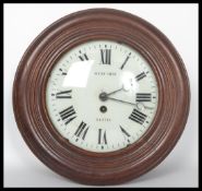 A 19th century French Bulls eye wooden cased Station wall clock, having Roman numeral chapter