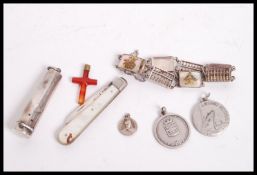 A group of silver items to include a Chinese silver and mother of pearl panel bracelet , a silver