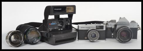 A collection of vintage 35mm cameras and lenses to include Praiktica, Olympus, please refer to