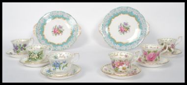 A collection of six Royal Albert Bone China cups and saucers for the months of the year together