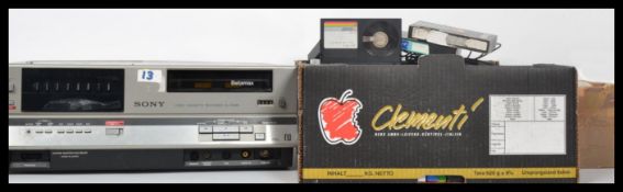 A vintage Sony Betamax video player recorder together with the original control box and instructions