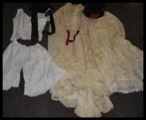 A small collection of ladies clothing dating from the 19th century to include 19th century Victorian