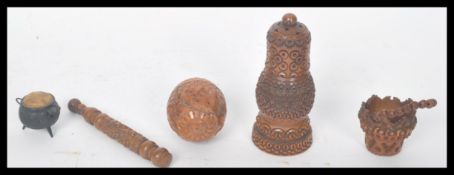 A group of 19th century Victorian Coquilla nut carved treen wares to include a stanhope ,