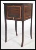 An Edwardian mahogany inlaid workbox - sewing box. Raised on squared tapering legs with box body