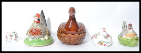 A group of ceramic animals to include a large brown pottery Portmeirion duck tureen, Staffordshire