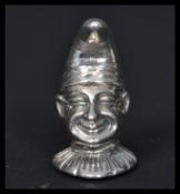 A sterling silver novelty pin cushion in the form of Mr Punch. Weighs 14.2 grams.