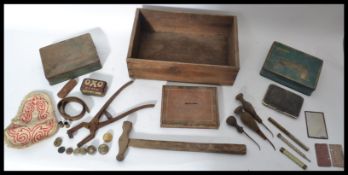 A collection of vintage items dating from the 19th century to include leather working tools