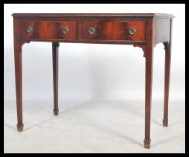 A good mahogany writing table desk being raised on square tapering legs with twin fitted drawers