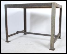 A stunning vintage 20th century industrial large metal factory worktop / bench, raised on square
