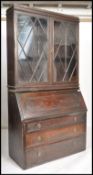 A 19th century flame mahogany bureau bookcase, ast