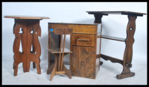 A 19th century eclesiastical oak two tier table together with a retro childs school desk and chair