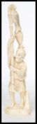 A late 19th century Oriental Japanese ivory carving carved figurine Okimono of a fisherman holding a