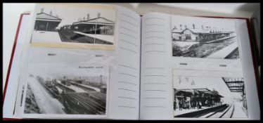 Vintage transport. Collection of b&w cards in four albums  showing steam locomotives (450+) with