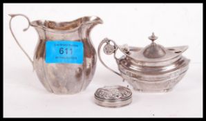 A silver hallmarked creamer Birmingham assay marks, makers marks for John Rose and dating to 1908