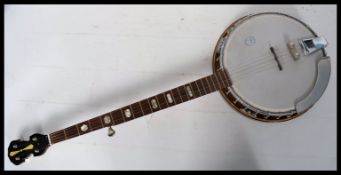 A beautiful original c1970's Banjo made by Kay . Five stringed instrument, with 12