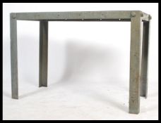 A stunning vintage 20th century industrial large metal factory worktop / bench / side table raised