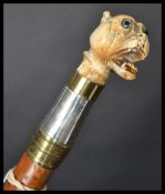 A 19th century Victorian silver walking stick cane having a tapering malacca shaft with silver