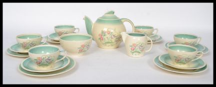 A 1930's Susie Cooper Dresden Spray six person tea service set consisting of six cups saucers and