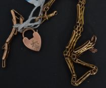 A 9ct heart padlock clasp along with a 9ct gold part expanding watch bracelet (af) and a 9ct gold