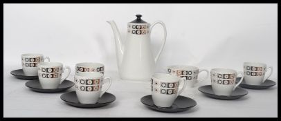 A retro 20th century 1970s coffee service in the Ballerina pattern, consisting of coffee pot, cups