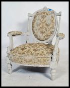 A 19th century French fauteuil armchair recently being up - cycled with a shabby chic finish and