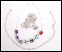 A dealers lot of silver to include silver chain linked large necklace with bar and hoop clasp and
