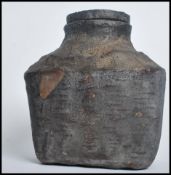 A Chinese 20th century frog basket of banded eboni