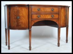 A 20th century Regency revival  mahogany sideboard, serpentine front, two drawers over arch