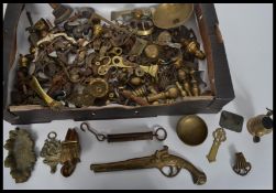 A large collection of varied period brass furniture castors, knobs and fittings.