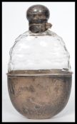 A stunning 19th century Victorian silver hallmarked and cut glass hip flask with silver hinged bun