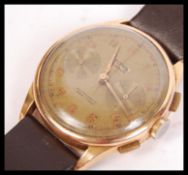 Titus Geneve - Gentleman's 18k gold case chronograph wristwatch, the signed silvered dial