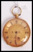 An 18ct gold continental pocket watch having a gilt dial with Roman numeral chapter ring and faceted